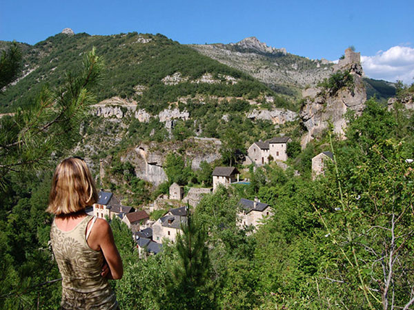 the castle of castelbouc stands atop a rocky spur