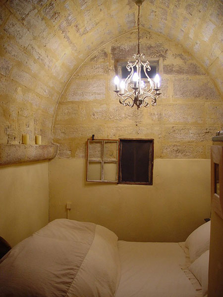 the master bedroom features an arched roof