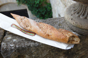 rarely does a baguette are it home without the end being nibbled off