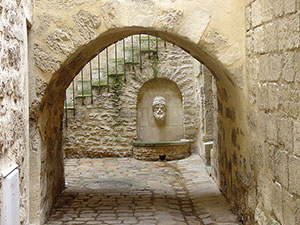 fountain down an alley uzes france